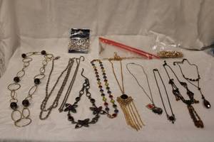 lot 394 image: White metal necklaces. Varying styles & makers. 12 count