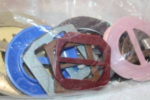 lot 407 image: Buckle and scarf clip selection. Some possibly Bakelite.