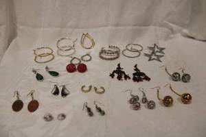 lot 414 image: Matched earrings. Varying styles, colors, material. Approx 15 pairs.