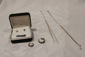 lot 423 image: Sterling Silver broken 16L necklace and (2) sterling rings. Also includes sterling Opal heart shaped earrings in presentation box (Missing one Opal). All marked.