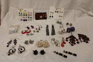 lot 411 image: Matched earrings. Varying styles, colors, material. Approx 15 pairs.