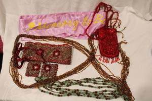lot 443 image: Mommy To Be pink sash and beaded belts and purse, accessories