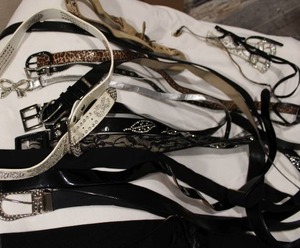 lot 436 image: Selection of non leather fashion belts. Varying styles and materials including patent leather