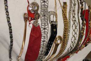 lot 440 image: Selection of metal, chain  and coin theme metal belts. Varying styles and motifs