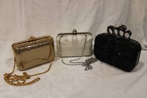 lot 446 image: Hard Case Clutches Gold Kate Landry , White delia , and Black 4 Finger Clutch