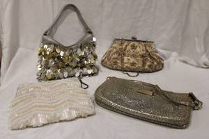 lot 452 image: Purses Jimmy Choo Made in Italy marked Clutch, White Beaded Evening Clutch, Silver with Gold Sequence Purse, and Gold Beaded Coin Purse