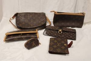 lot 457 image: Louis Vuitton marked Purse and Wallets (most say Louis Vuitton Paris)