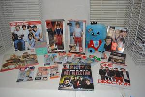 lot 469 image: One Direction Items Magazines, Dolls, Keychains, Book The Big Book of One Direction, see pictures