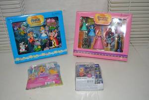 lot 471 image: Unopened Toys Alice in Wonderland Set, Sleeping Beauty Set, Flash Sentry, and Auroras Picnic Surprise