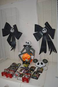 lot 477 image: Halloween - The Night Before Christmas Collection Includes Hot Wheels Cars, Tree Ornaments, Plush Jack Sitting on Pumpkin, Door Ribbons