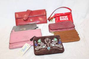 lot 519 image: Fossil Wallets, Hobo Wallet, and Steve Madden Luggage Tag