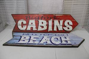 lot 487 image: Wooden Arrow Signs Bigfork Cabins and Whitefish Beach