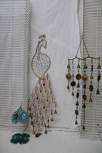 lot 495 image: Large Wind Chimes Peacock has feather attachments