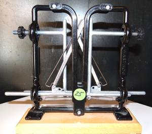 lot 25 image: WARTHOG KNIFE SHARPENER WITH WOODEN BASE