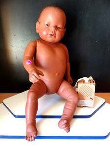 lot 27 image: Reality Works BABY THINK IT OVER DOLL - African American Female as Shown