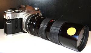 lot 31 image: VINTAGE Canon AE-1 Program 35mm Film Manual Camera w F3.5 Telephoto Lens - $$$