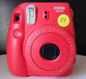 lot 84 image: Fujifilm Instax Mini 8 Instant Film Camera - Red