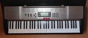 lot 120 image: Casio LK-230 61 Lighted Keys Portable Arranging Keyboard w Voice Pad