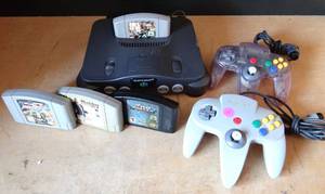 lot 141 image: VINTAGE NINTENDO 64 GAMING SYSTEMS WITH 4 GAME AS SHOWN