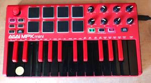 lot 220 image: Akai Professional MPK mini mk3 Keyboard Controller Red - POWER TESTED GOOD