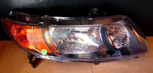 lot 237 image: TYC 20-6735-B1-1N  Headlight Assembly f(BELIEVE FOR HONDA CIVIC) APPEARS UNUSED