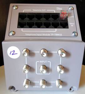 lot 12 image: TP-TBM10 USTEC 10 TELEPHONE-OUT PORTS, 1 TELEPHONE-IN  8 COAX $$