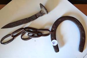 lot 81 image: ANTIQUE IRON HORSESHOE, CHAIN, AND SPIKE AS SHOWN