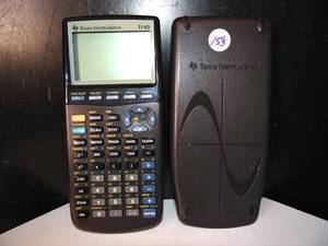 lot 153 image: TEXAS INSTRUMENTS TI-83 CALCULATOR - WORKS