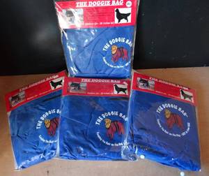 lot 201 image: THE DOGGIE BAG - Dog grooming bag Prevent pet shedding The doggie bag Protect Car from Hair (4 X MONEY)