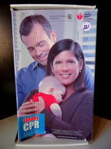 lot 221 image: Infant CPR Anytime Kit Mini Baby Manikin AHA Bilingual -NewOpen Box