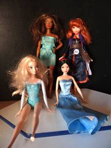 lot 244 image: ASSORTMENT OF DOLLS AS HOWN - SEE PICS FOR SPECS (REDHEAD HAS VOICEBOX)