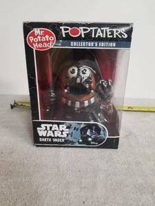 lot 34 image: Poptaters Star Wars Disney collectible