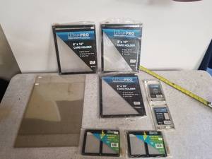 lot 37 image: Selection of card protectors