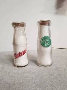 lot 63 image: Selection of 2 glass milk bottles - Green Spot & Producers Dairy