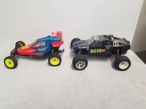 lot 125 image: Selection of RC cars for repair or parts