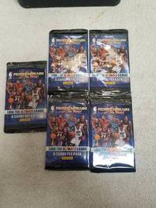 lot 59 image: Selection of 5 unopened Panini packs of basketball cards