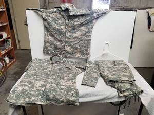 lot 247 image: Army issued shirts and pants