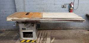 lot 20 image: Delta Rockwell 10 UniSawTable Saw Model 34-450 with Rail