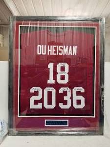 lot 1 image: Oklahoma Heisman Trophy Winners framed Jersey - Steve Owens, Billy Sims and Jason White