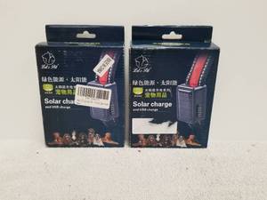 lot 74 image: Lot of 2 Solar charge dog collars