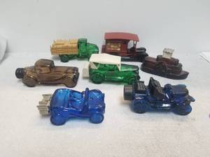 lot 110 image: Selection of 7 Avon after shave decanters some are full