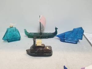 lot 136 image: Selection of 4 Nautical-boat themed Avon after shave decanters -