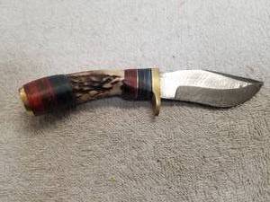 lot 30 image: Fixed Damascus Blade knife with leather sheath