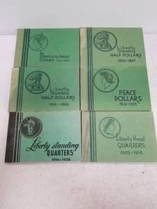 lot 214 image: Vintage coin holder books