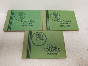 lot 169 image: Vintage coin holder books