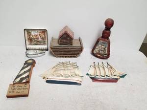 lot 92 image: Selection of boat themed decor.