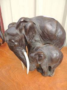 lot 57 image: Elephant mom and calf wood carving
