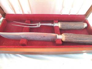 lot 75 image: Carving set in box El Toro schmit and Ziegler Solingen Germany  handles are antlers