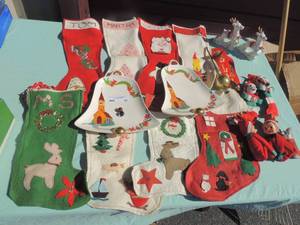 lot 80 image: Vintage christmas 8 vintage felt stockings, 2 porcelain bell trays, blown glass gold tree topper, mouse in stocking and much more
