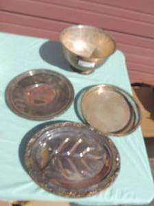 lot 87 image: 4 pieces of silver plate Reed and Barton platter, Footed platter, Round platter, and Everetts jewelers large bowl